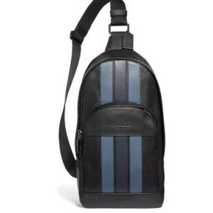 Coach West pack with varsity stripe